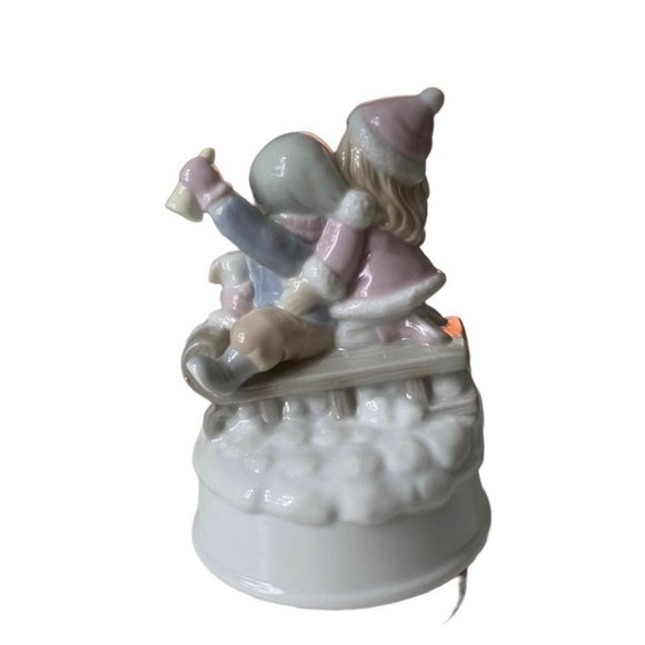 Let It Snow” Summit Collection Musical Rotating Ceramic Christmas Sledding - Picture 3 of 5